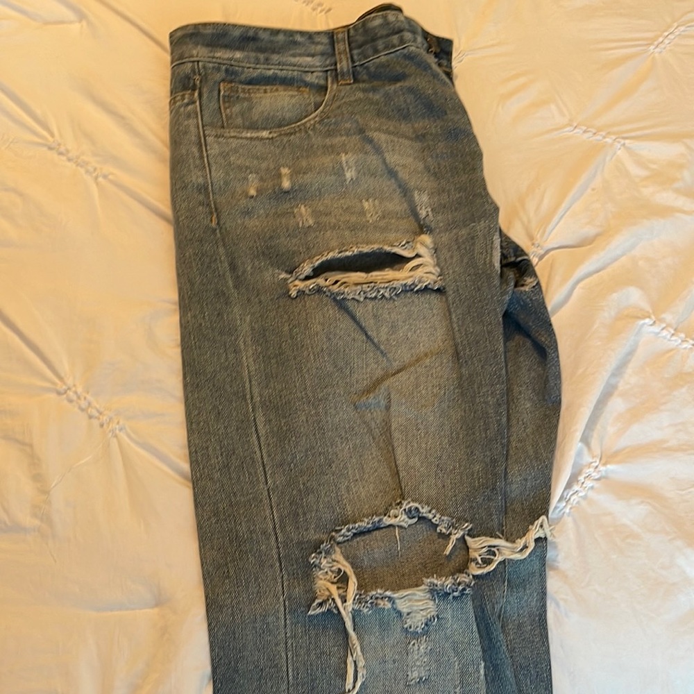 Embellish jeans with rips